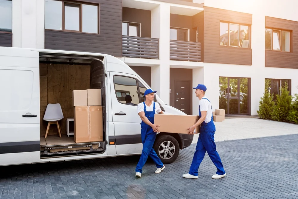 our movers in dubai moving furniture in van